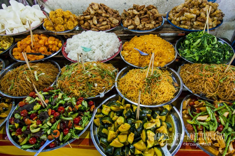 At the food market at Luang Prabang delicious local food is offered for little money.